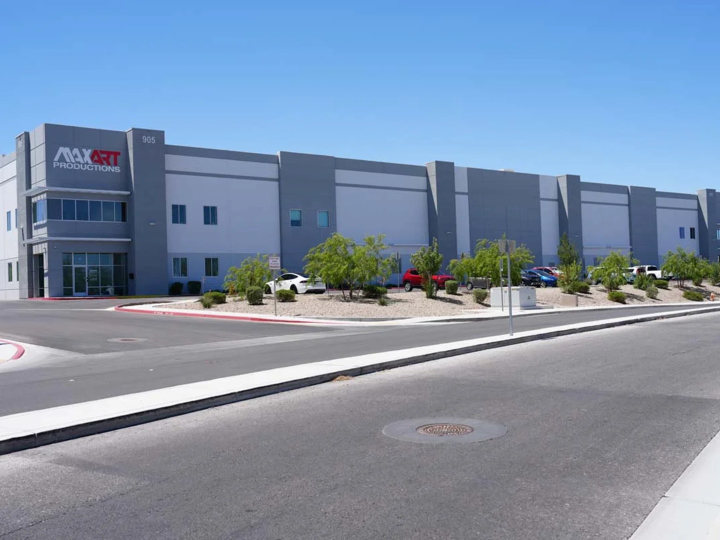 Facility wide shot — 42,000 sq ft production floor, people at work
